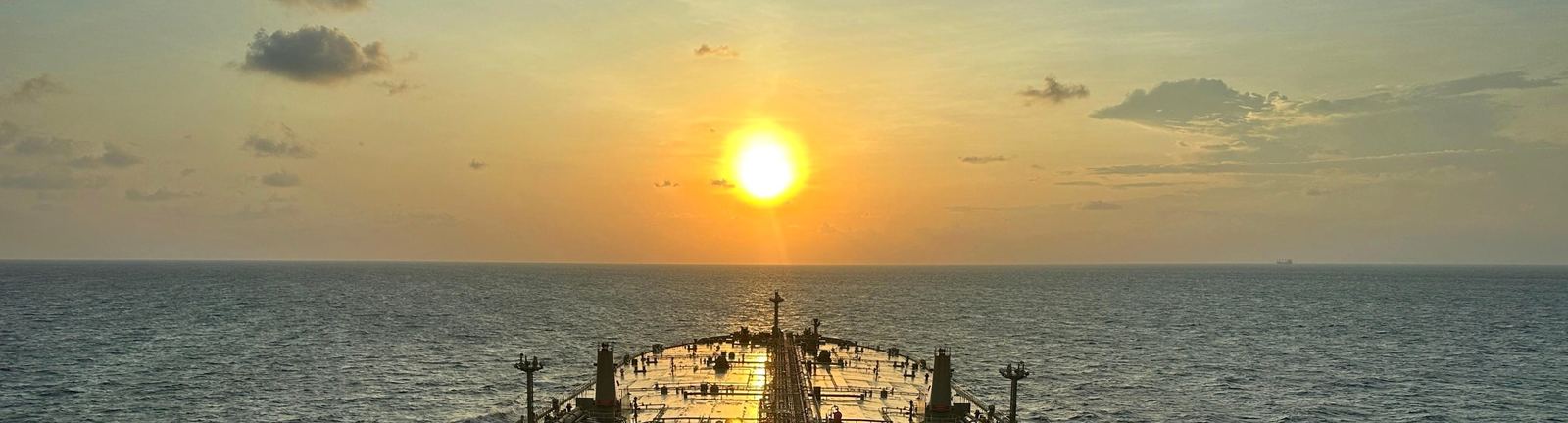 Tanker deck underway at sunset